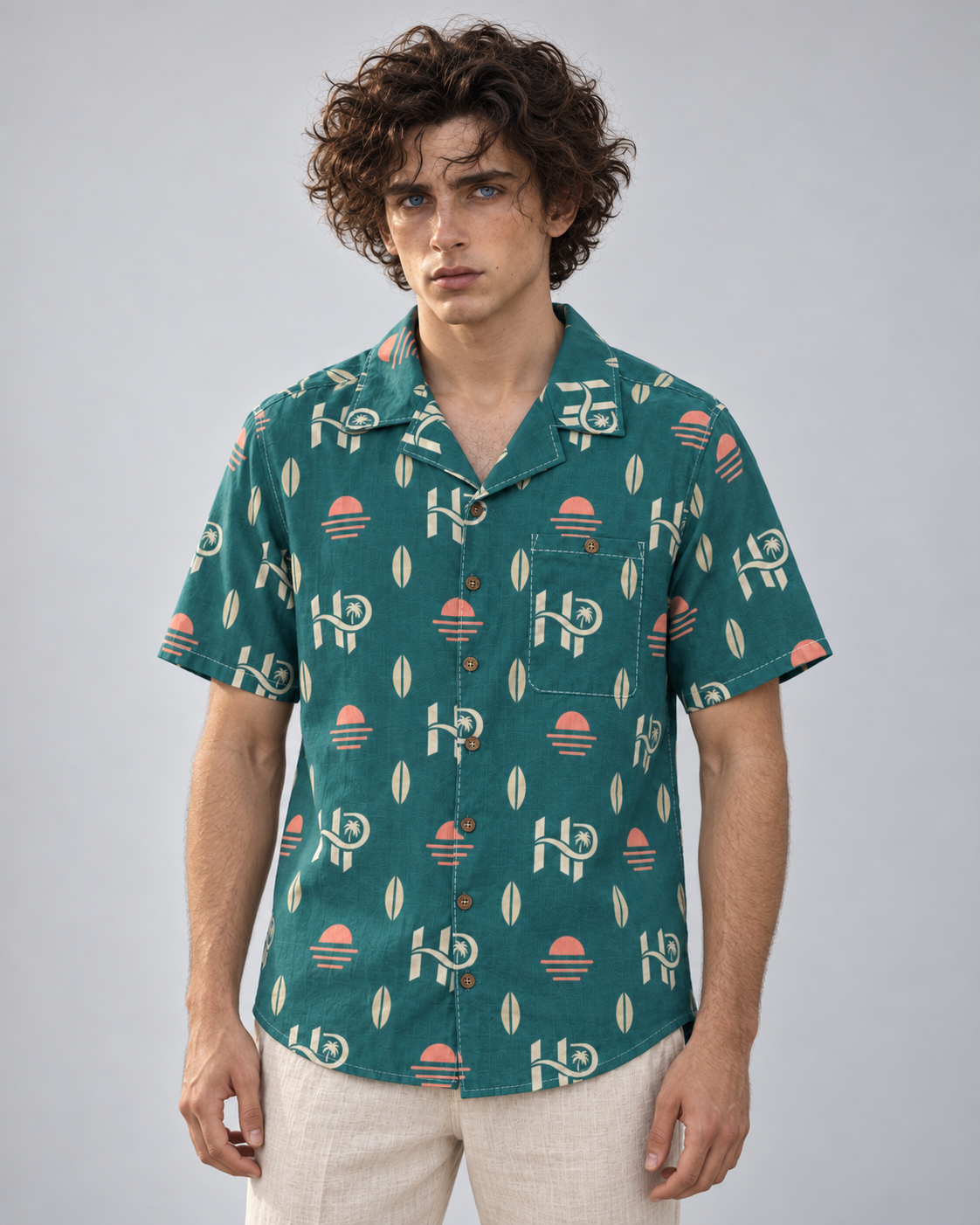 Front studio view of HP Sunset Monogram Hawaiian Shirt in teal and coral