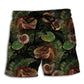 Dinosaur With Tropical Green Leaves – Beach Short