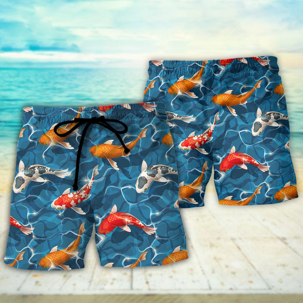 Colorful Koi Fish Swimming In Garden Pond – Beach Short